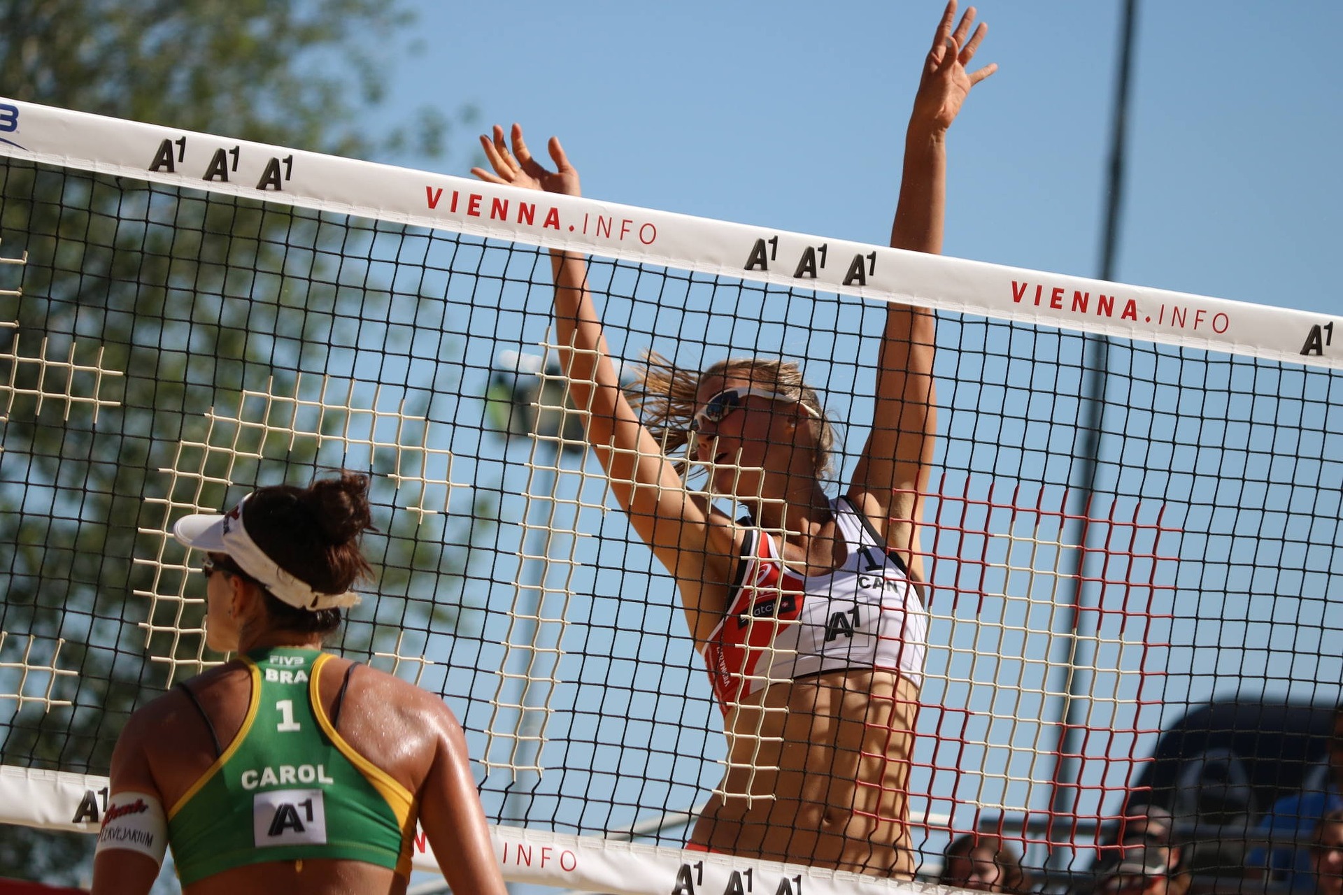 Volleyball players mid game